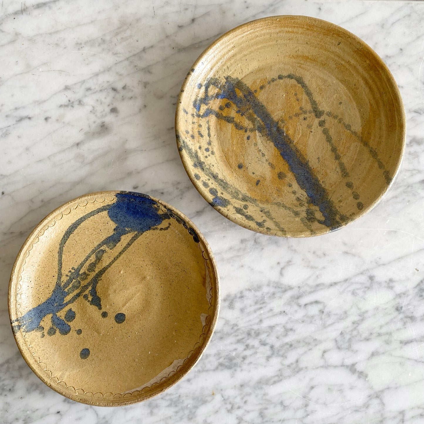 Vintage Pottery Plate with Blue Splatter Design