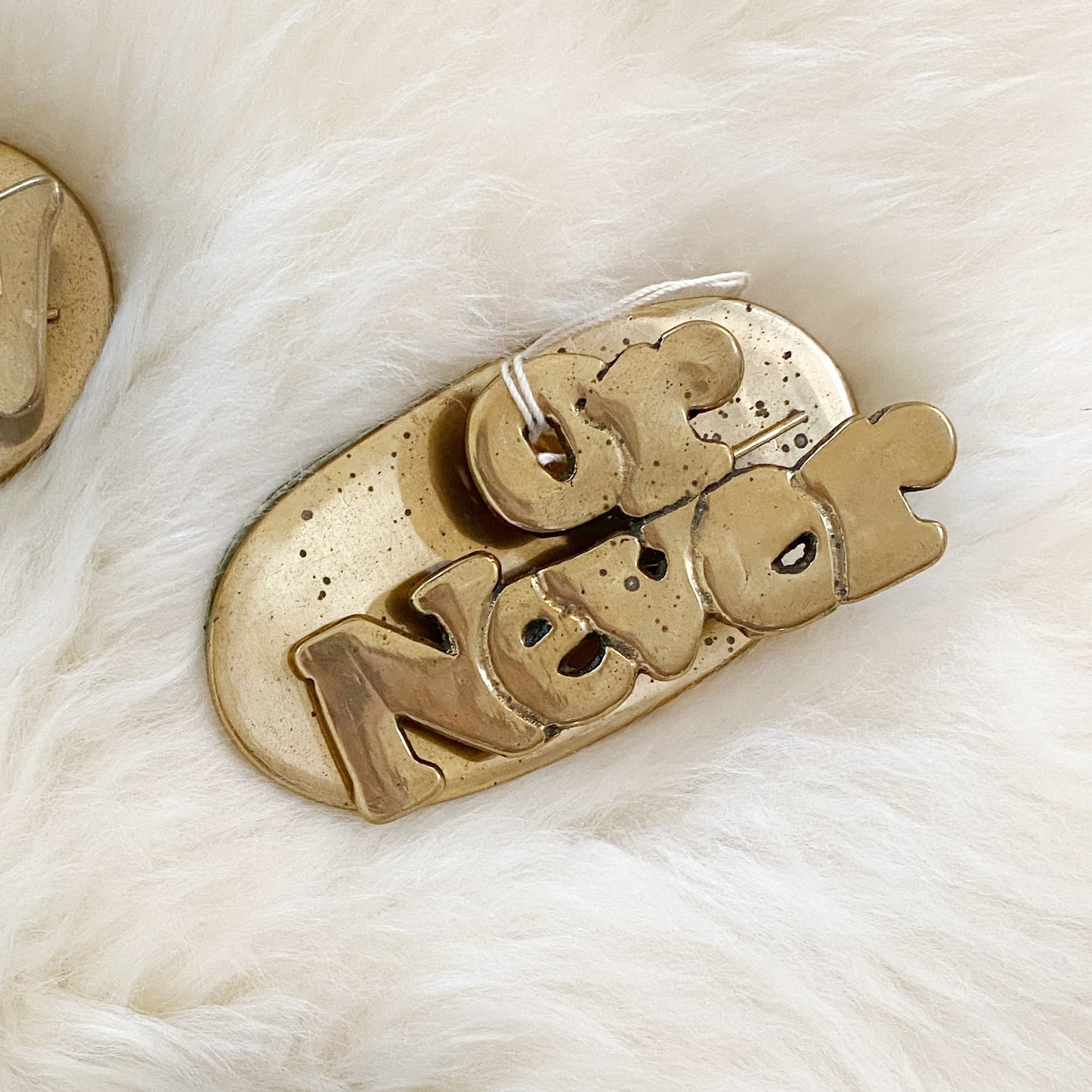 Vintage Brass Office Clip: Now, Never, or Later