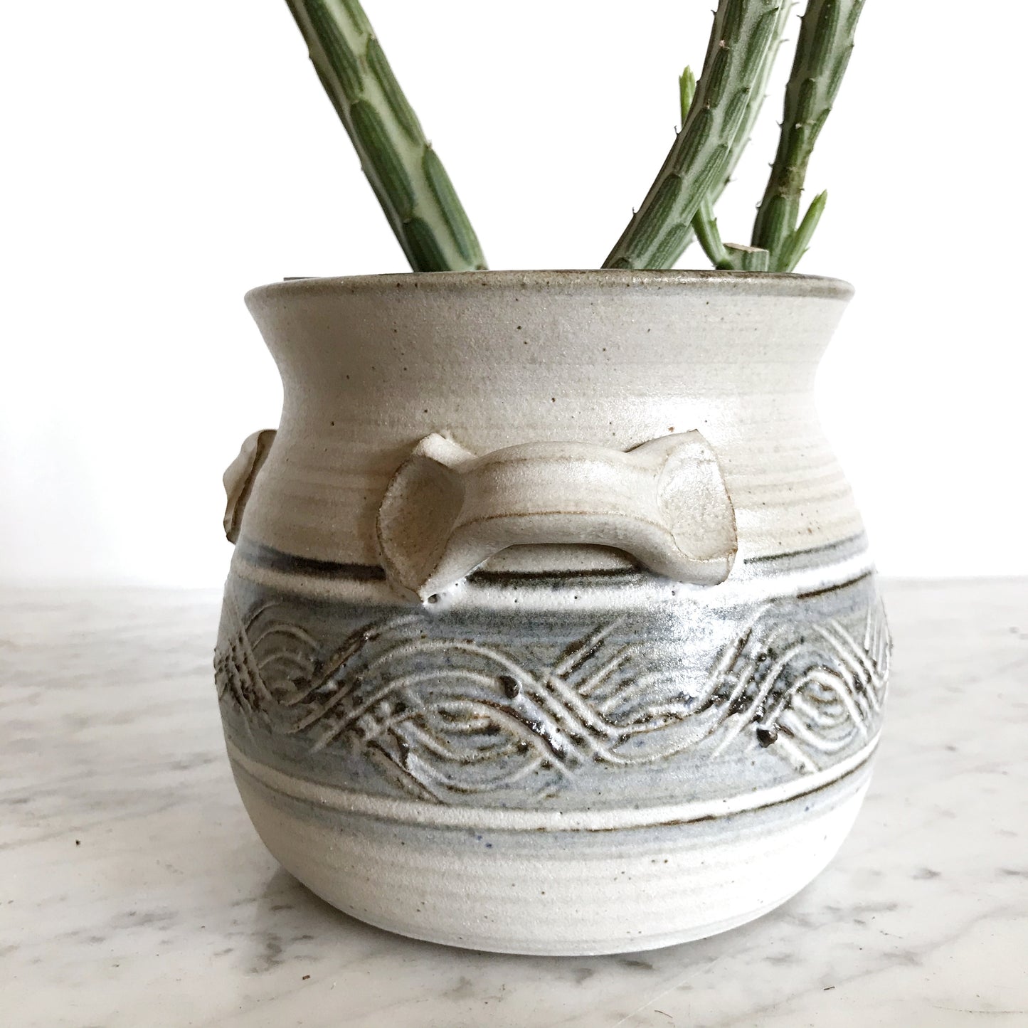 Vintage Pottery Vessel with Waves