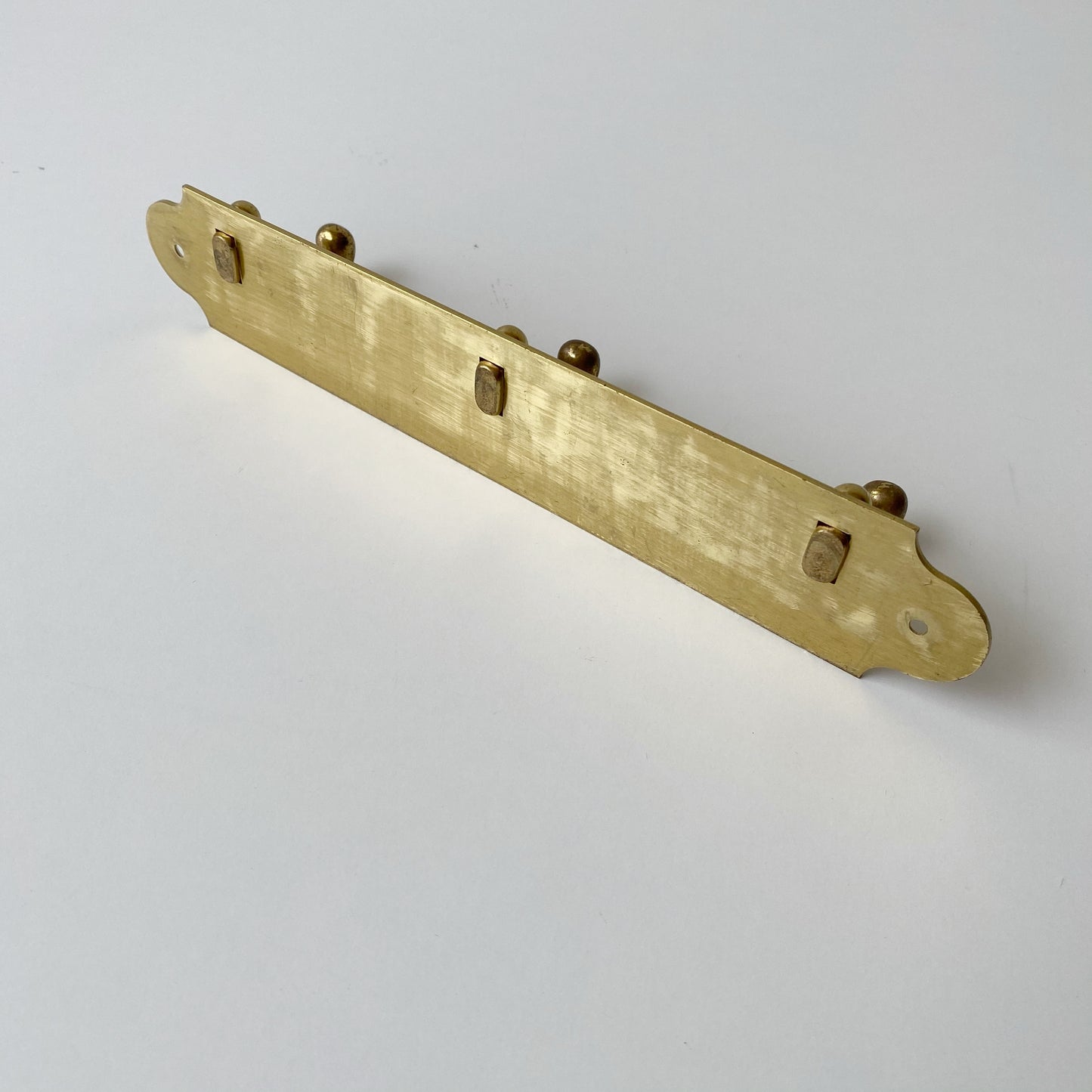 Vintage Brass Wall Hooks on Plaque