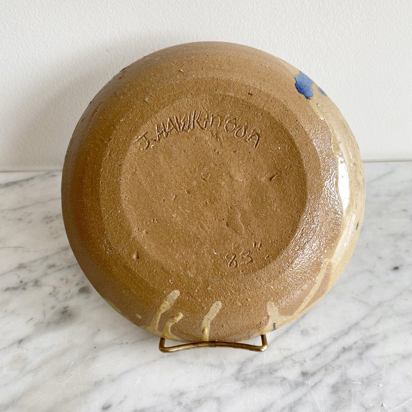 Vintage Pottery Plate with Blue Splatter Design