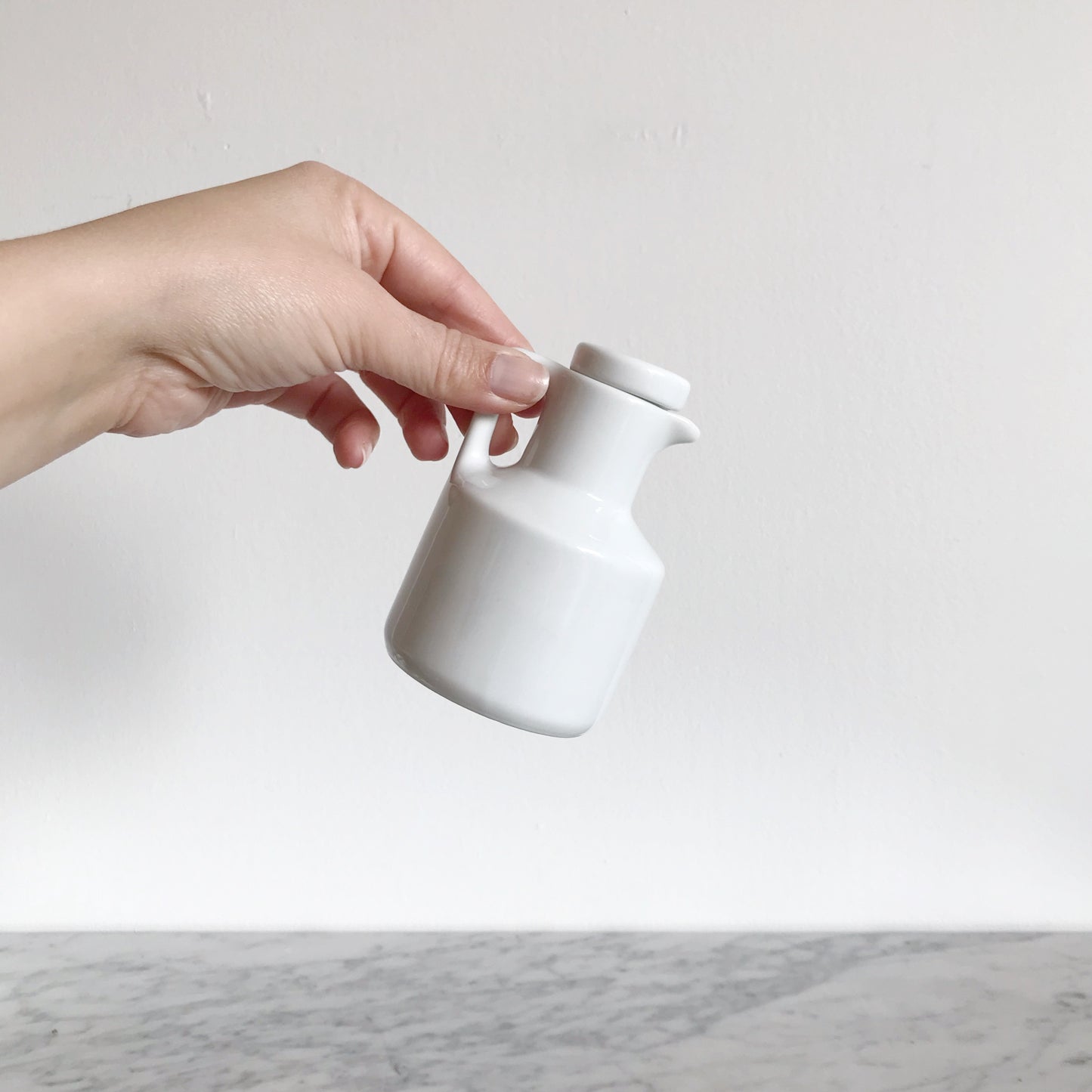 Small White Ceramic Pitcher