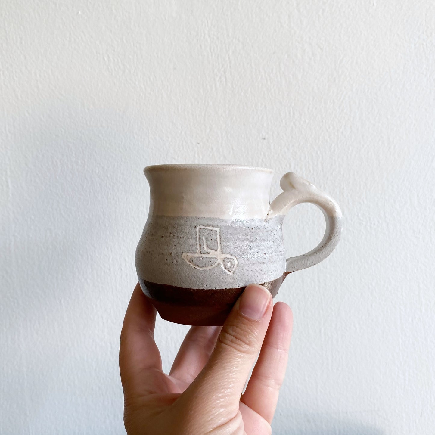 Petite Handcrafted Pottery Mug with Abstract Bird