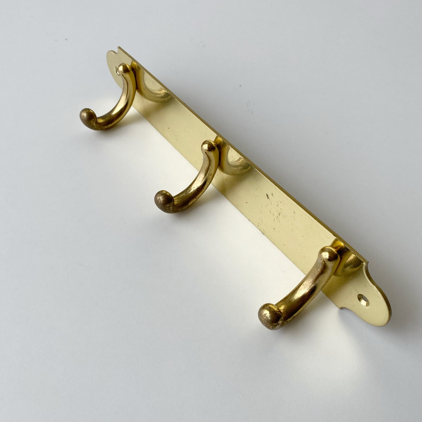 Vintage Brass Wall Hooks on Plaque