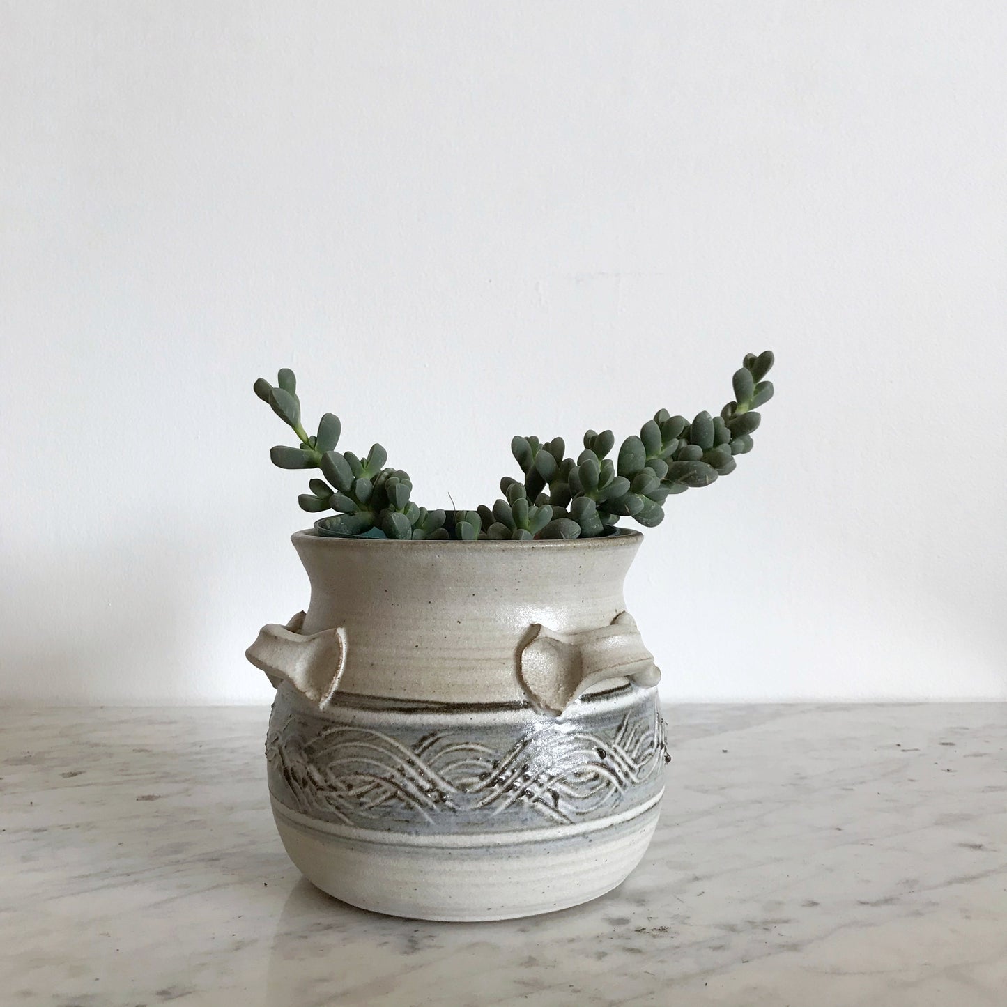 Vintage Pottery Vessel with Waves