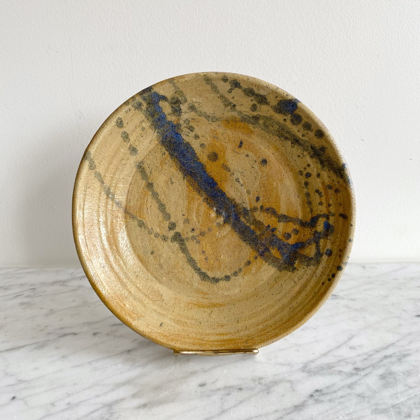 Vintage Pottery Plate with Blue Splatter Design