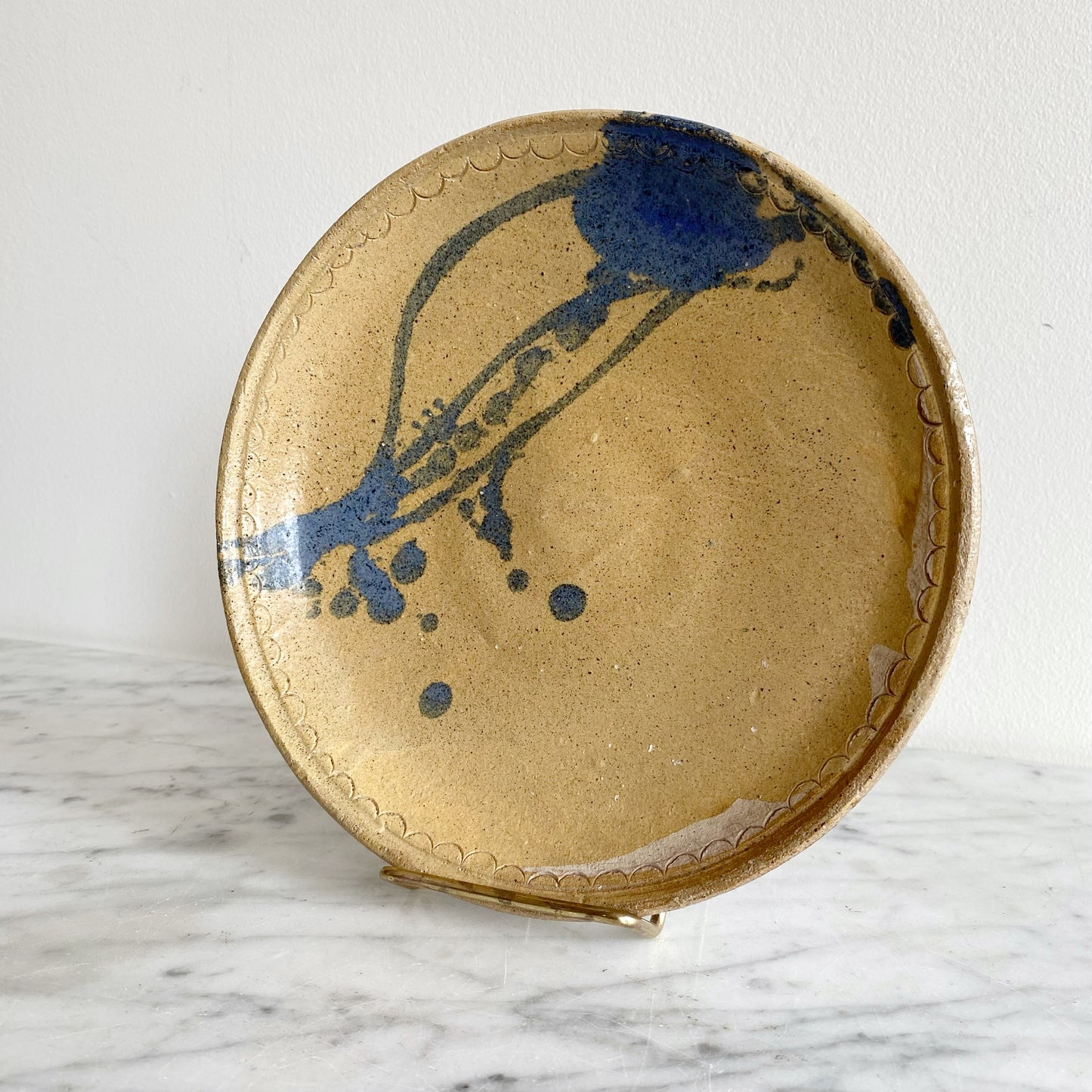 Vintage Pottery Plate with Blue Splatter Design