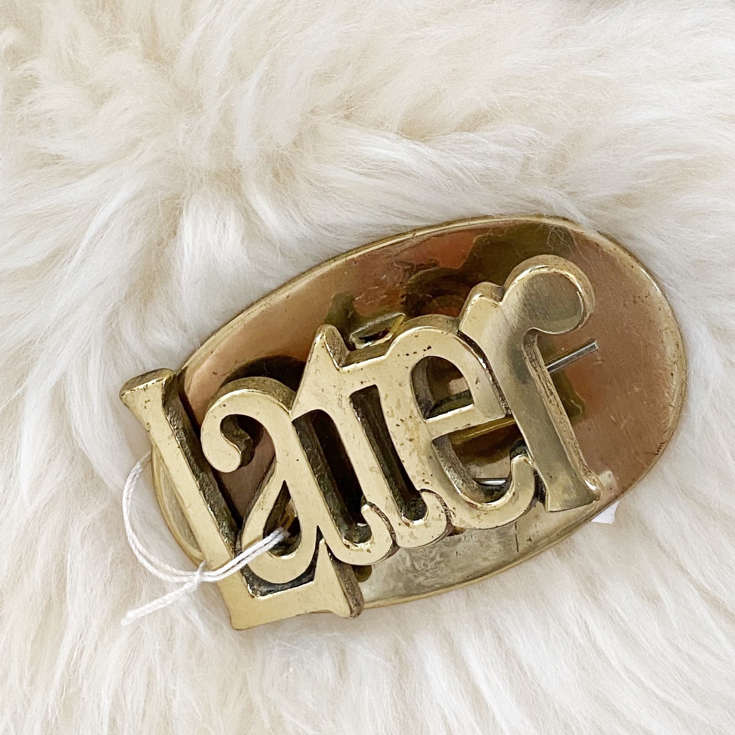 Vintage Brass Office Clip: Now, Never, or Later