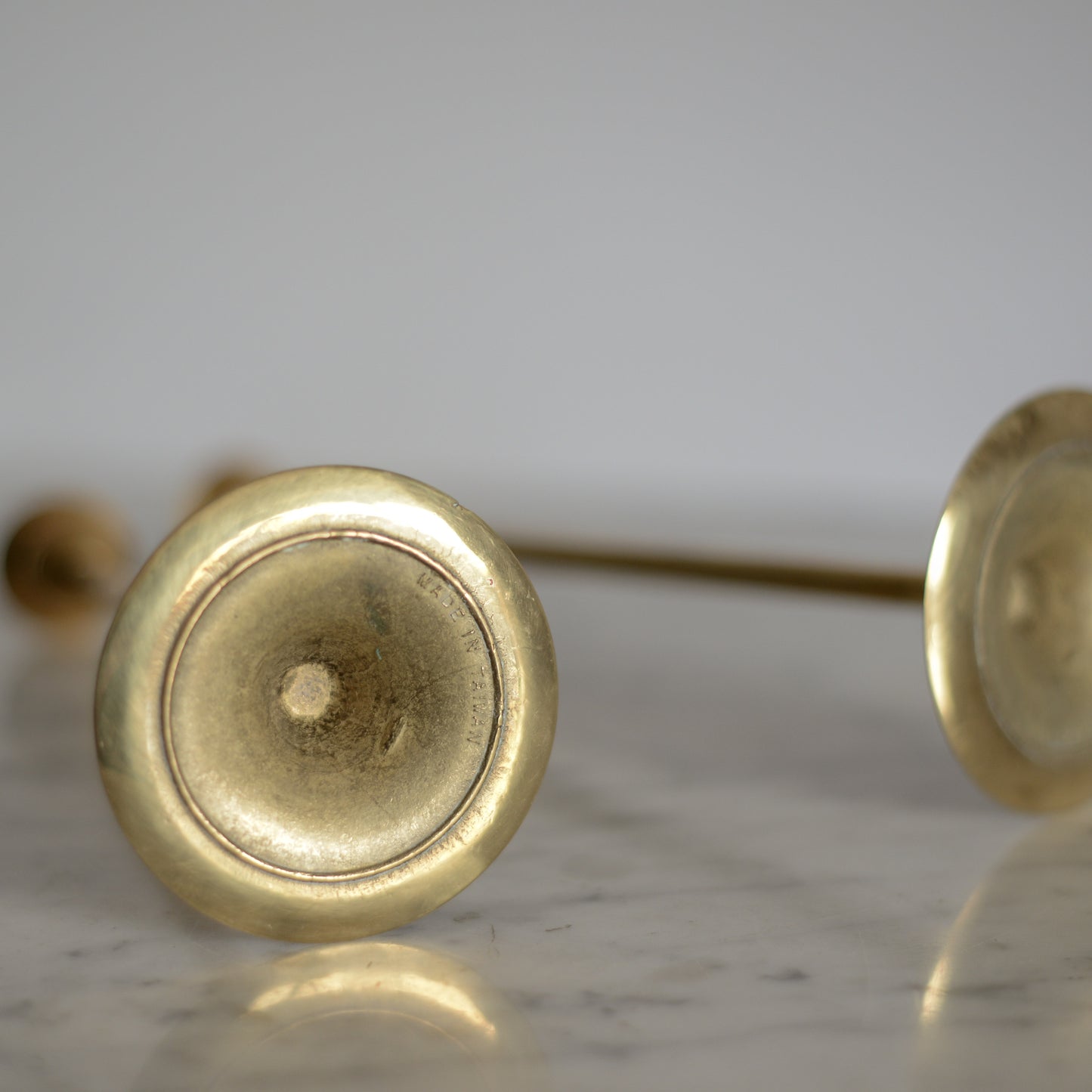 Pair of MCM Slender Brass Candle Holders