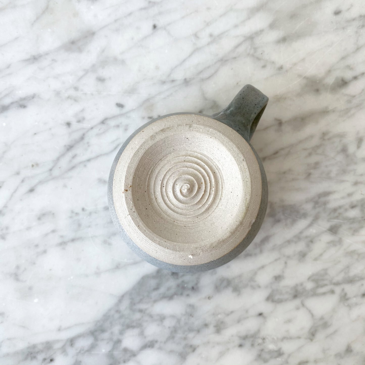 Handcrafted Footed Pottery Mug