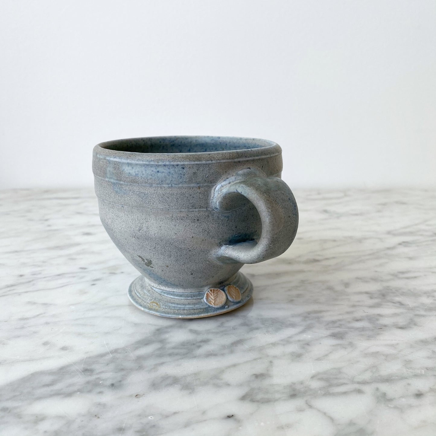 Handcrafted Footed Pottery Mug