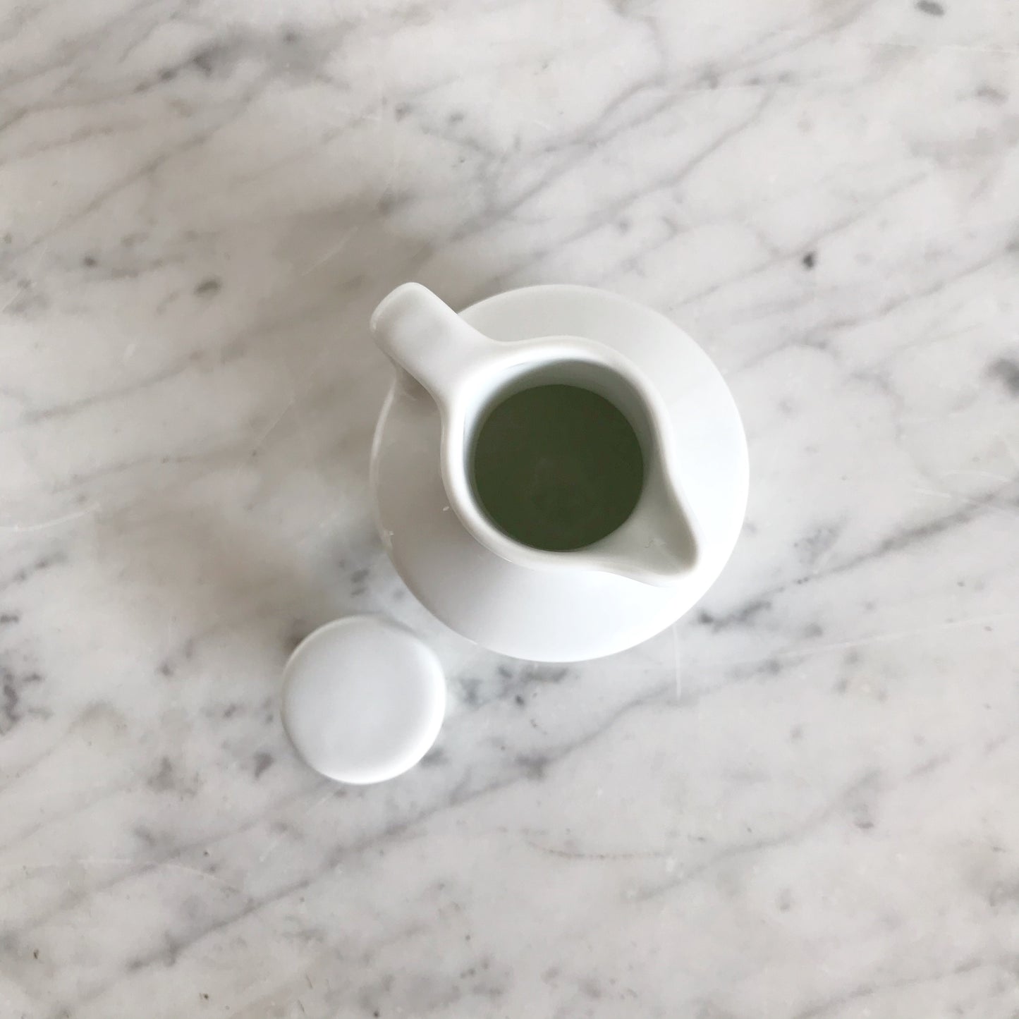 Small White Ceramic Pitcher