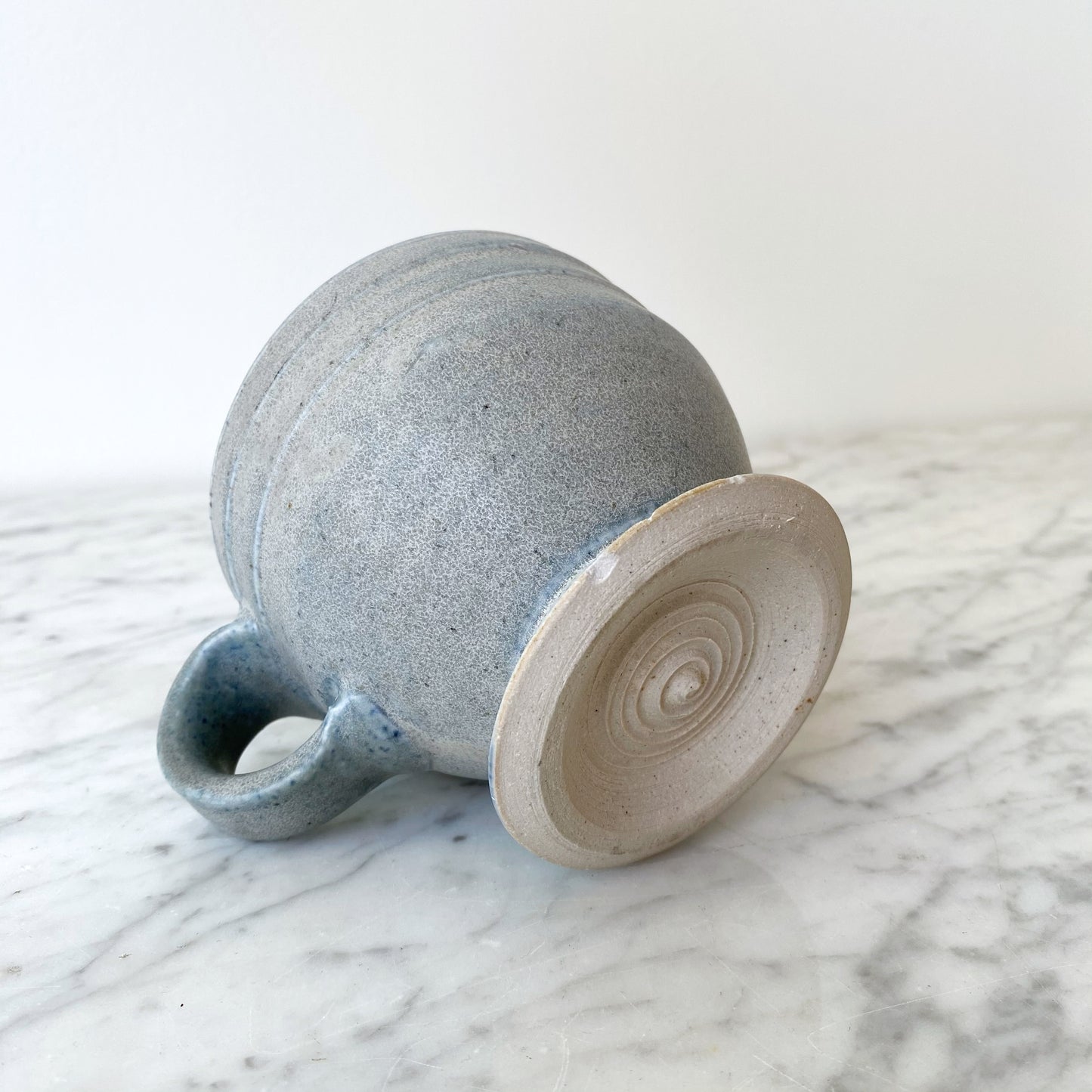 Handcrafted Footed Pottery Mug