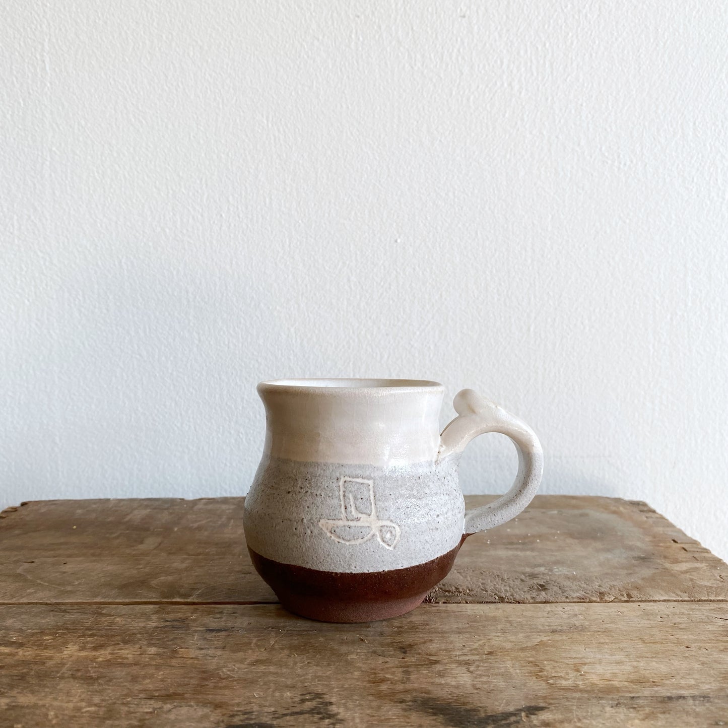Petite Handcrafted Pottery Mug with Abstract Bird