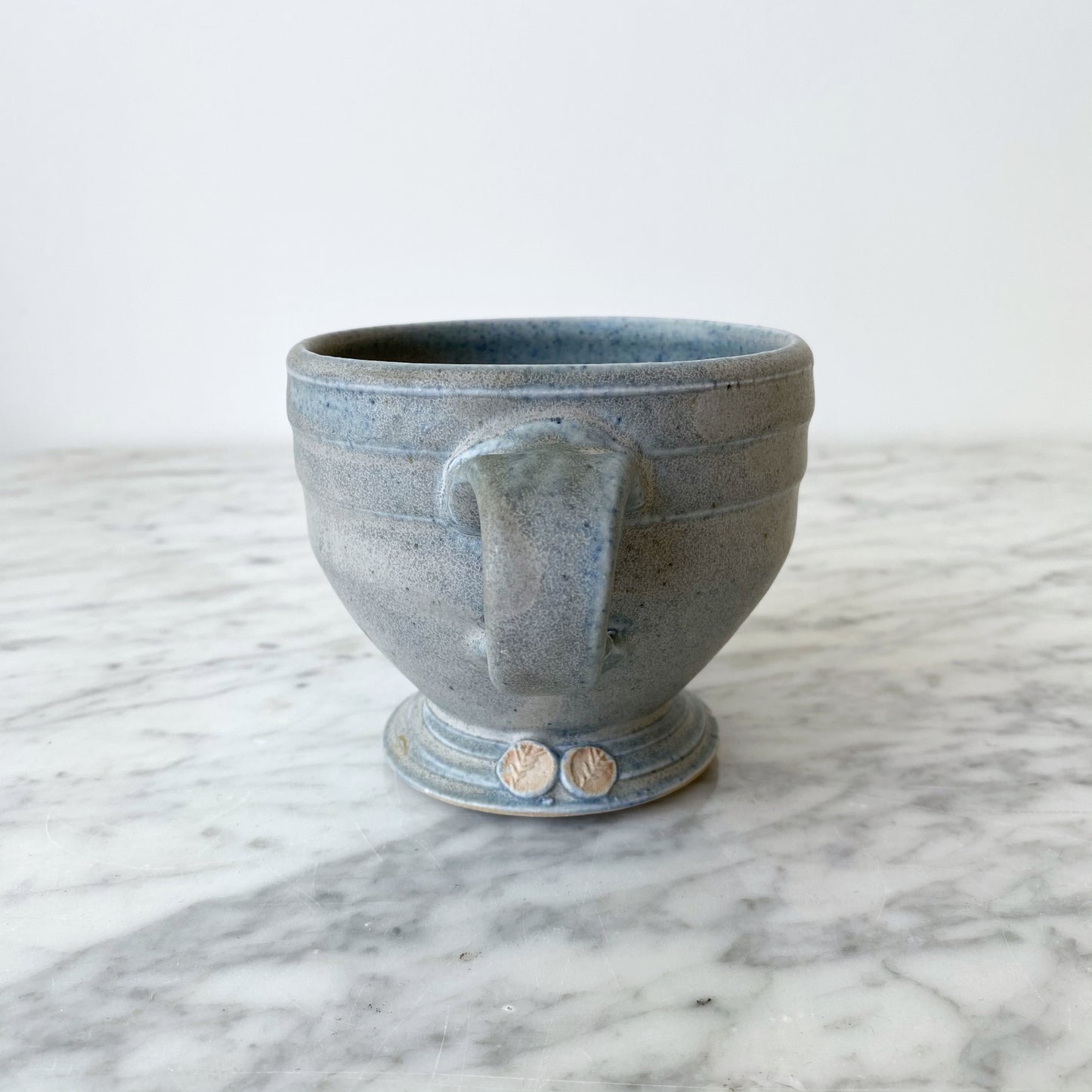 Handcrafted Footed Pottery Mug