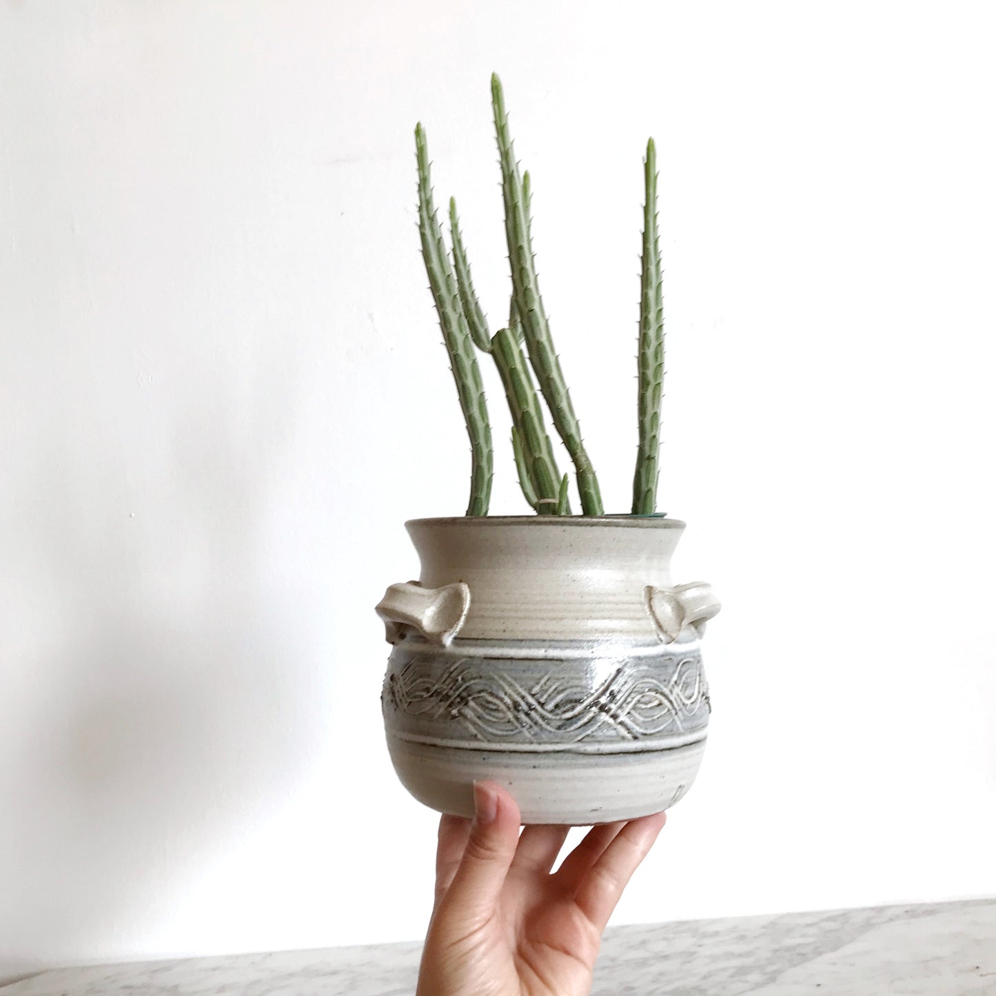 Vintage Pottery Vessel with Waves