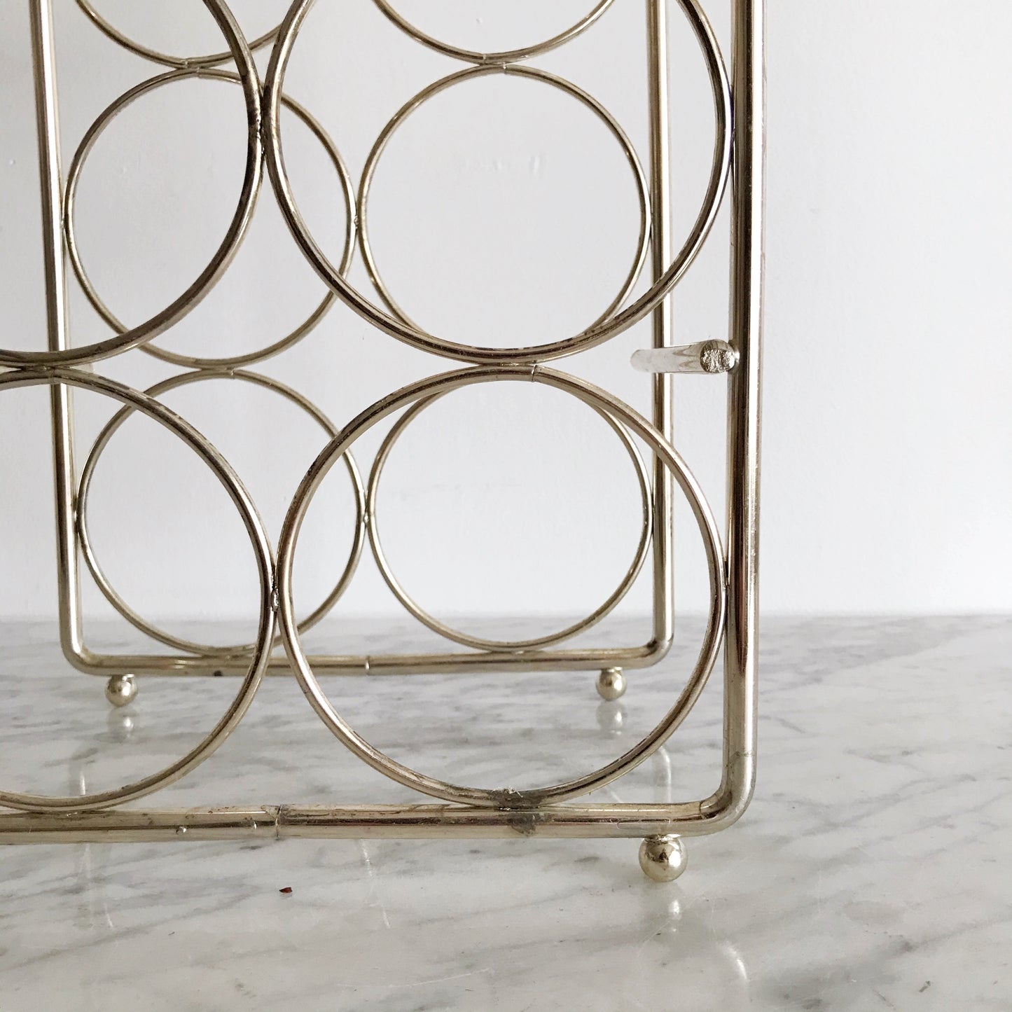 Vintage Gold Metal 7-Bottle Wine Rack