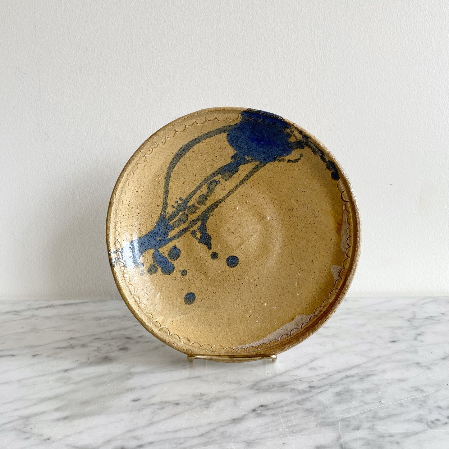 Vintage Pottery Plate with Blue Splatter Design