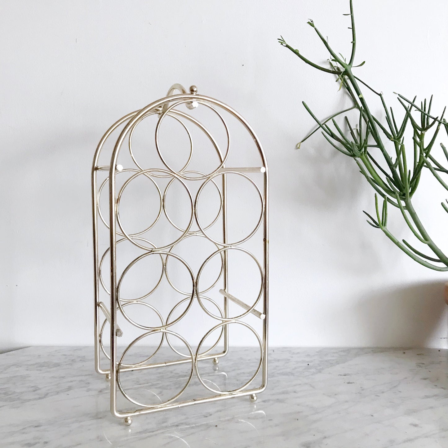 Vintage Gold Metal 7-Bottle Wine Rack